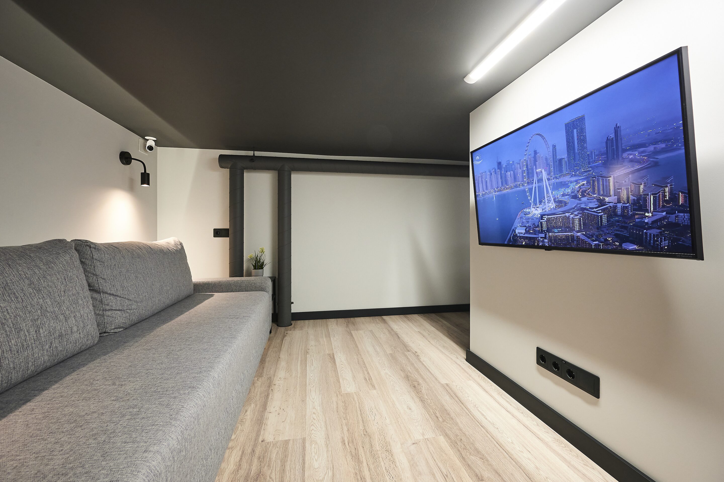TV lounge with a sofa